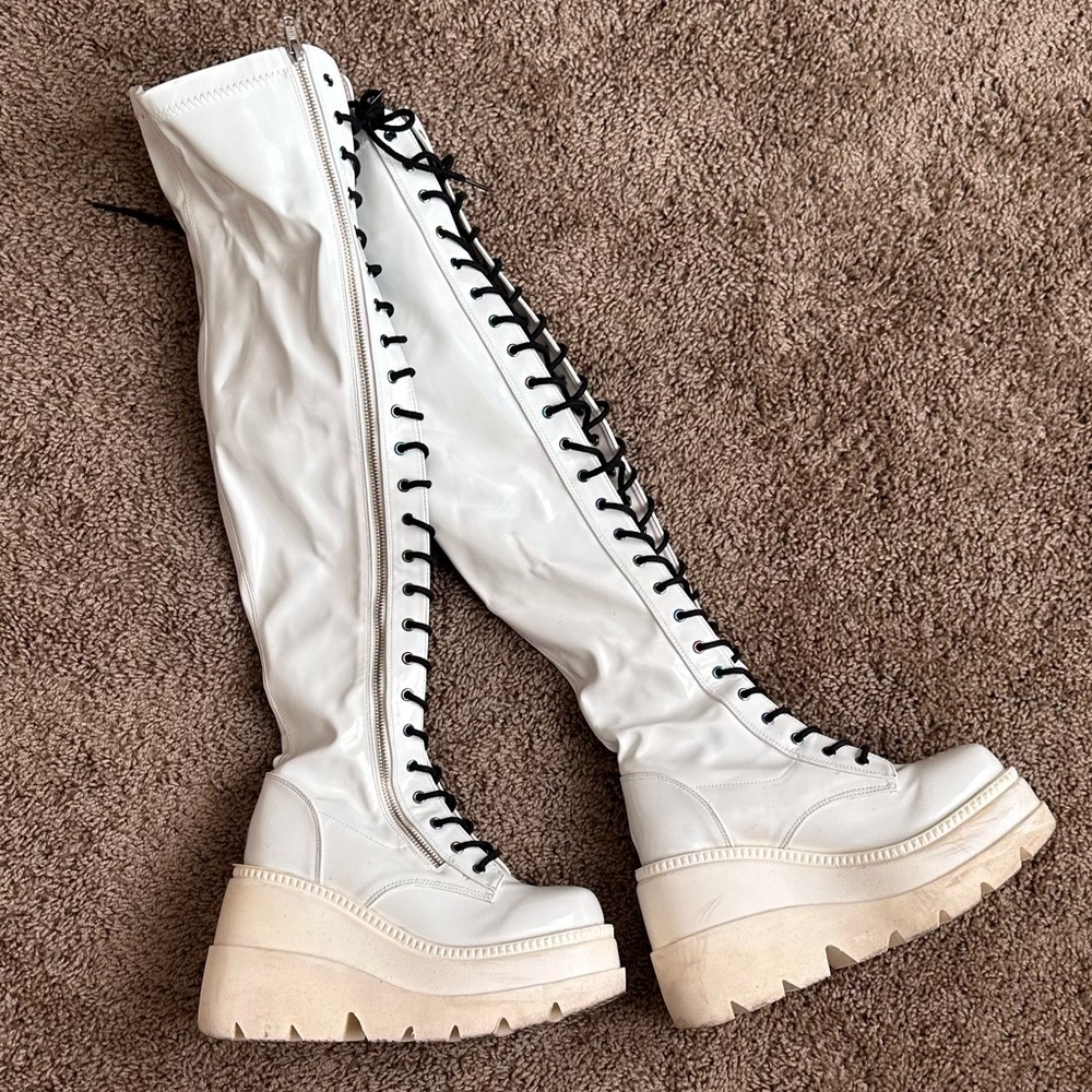 Demonia White Shaker-374 Knee High Platforms
